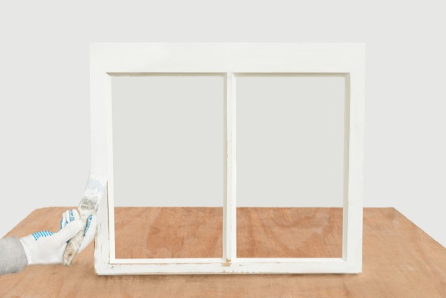A fully restored white timber box sash window