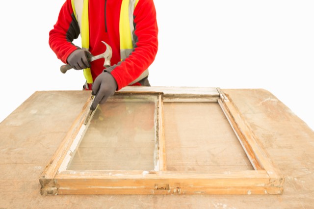 A box sash window taken out of the frame for re-cording on the bench
