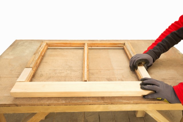 New timber spliced into a sash window frame during repair